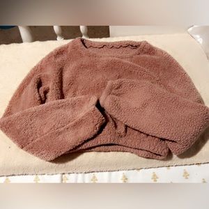 small pinkish brown crop top